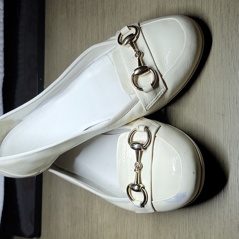 White Gucci loafers